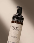 A close up of a bottle of probiotic intimate wash by Pinc Wellness