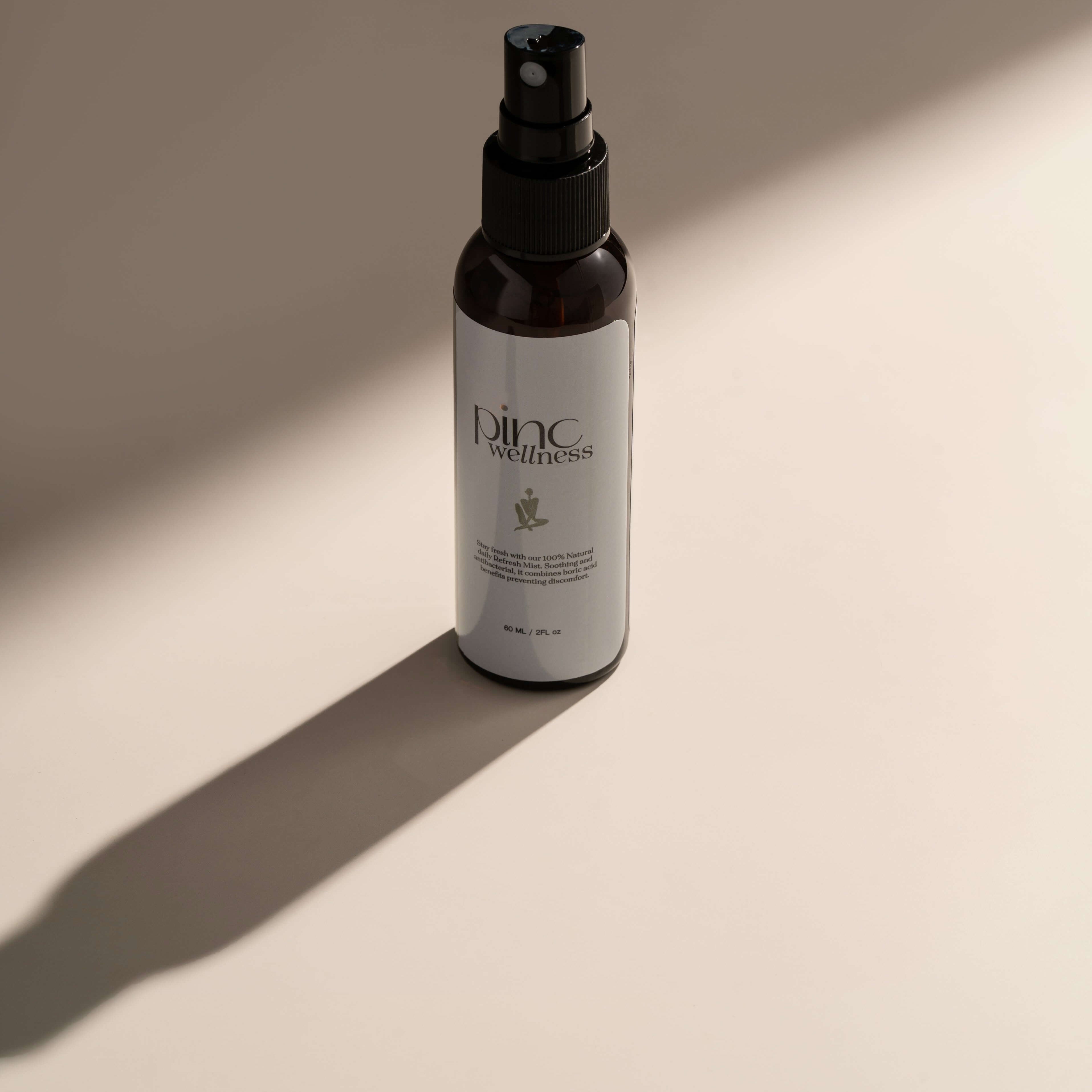 A refreshing boric acid mist by Pinc Wellness, designed to maintain vaginal pH balance and freshness throughout the day