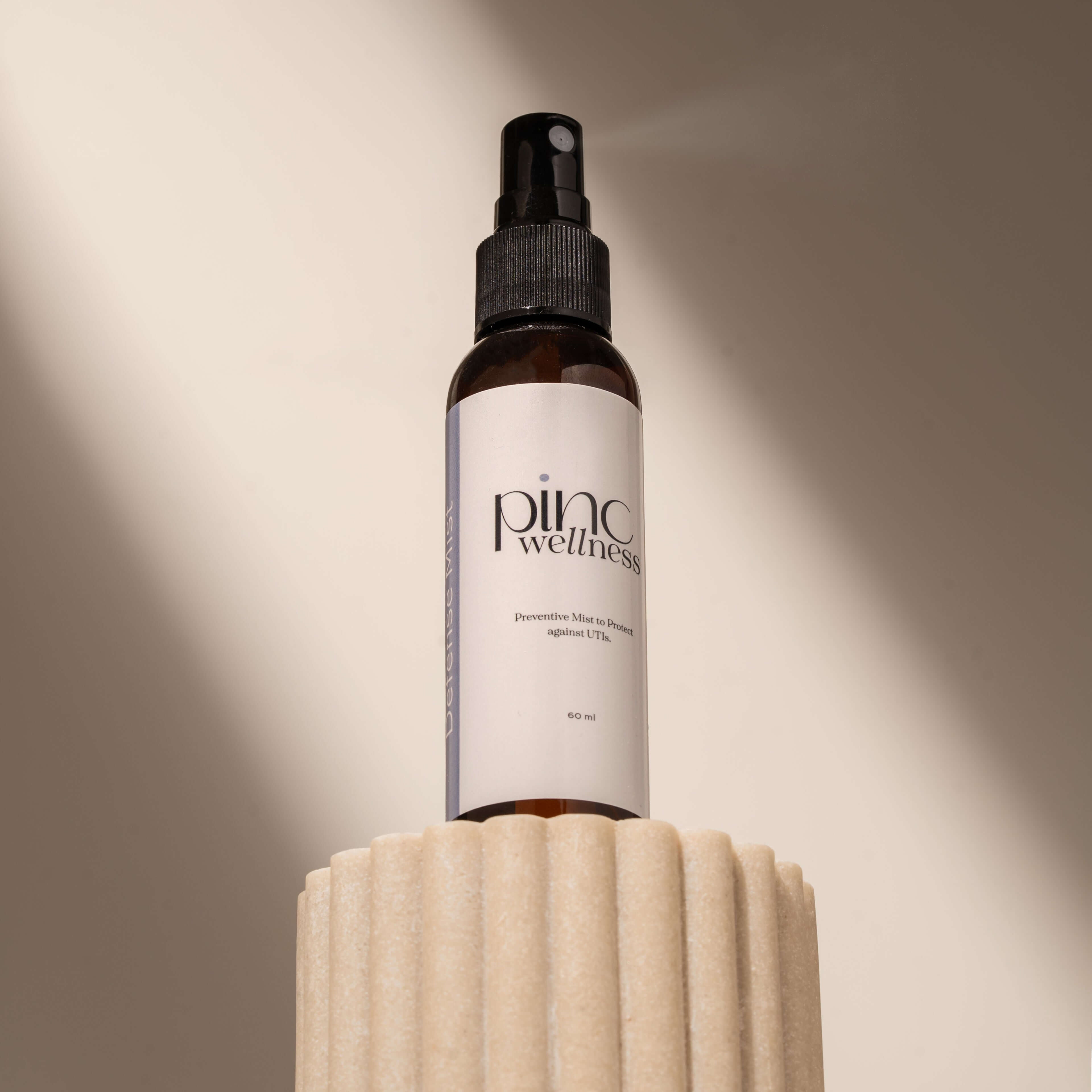A bottle of UTI Prevent Mist by Pinc Wellness