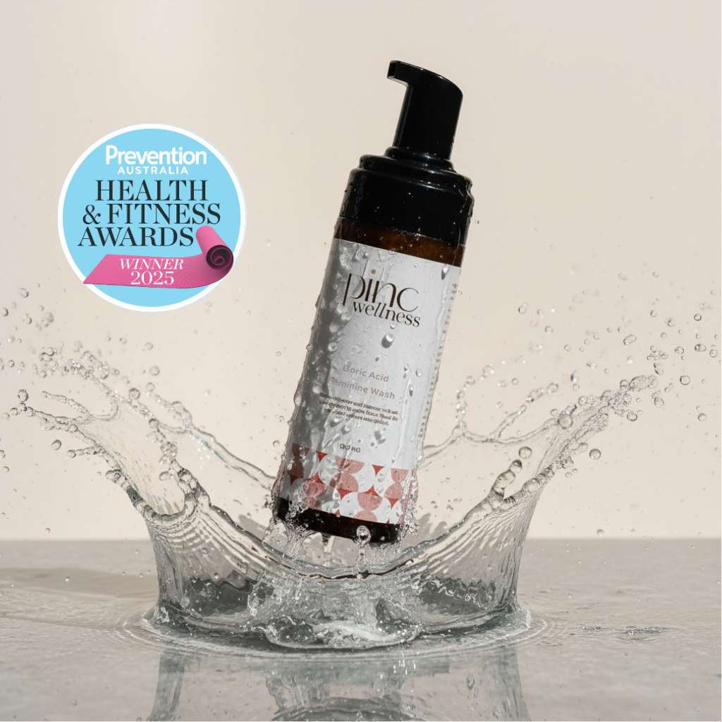 Pinc Wellness bottle with water splash and Prevention Australia Health & Fitness Awards badge on a light background