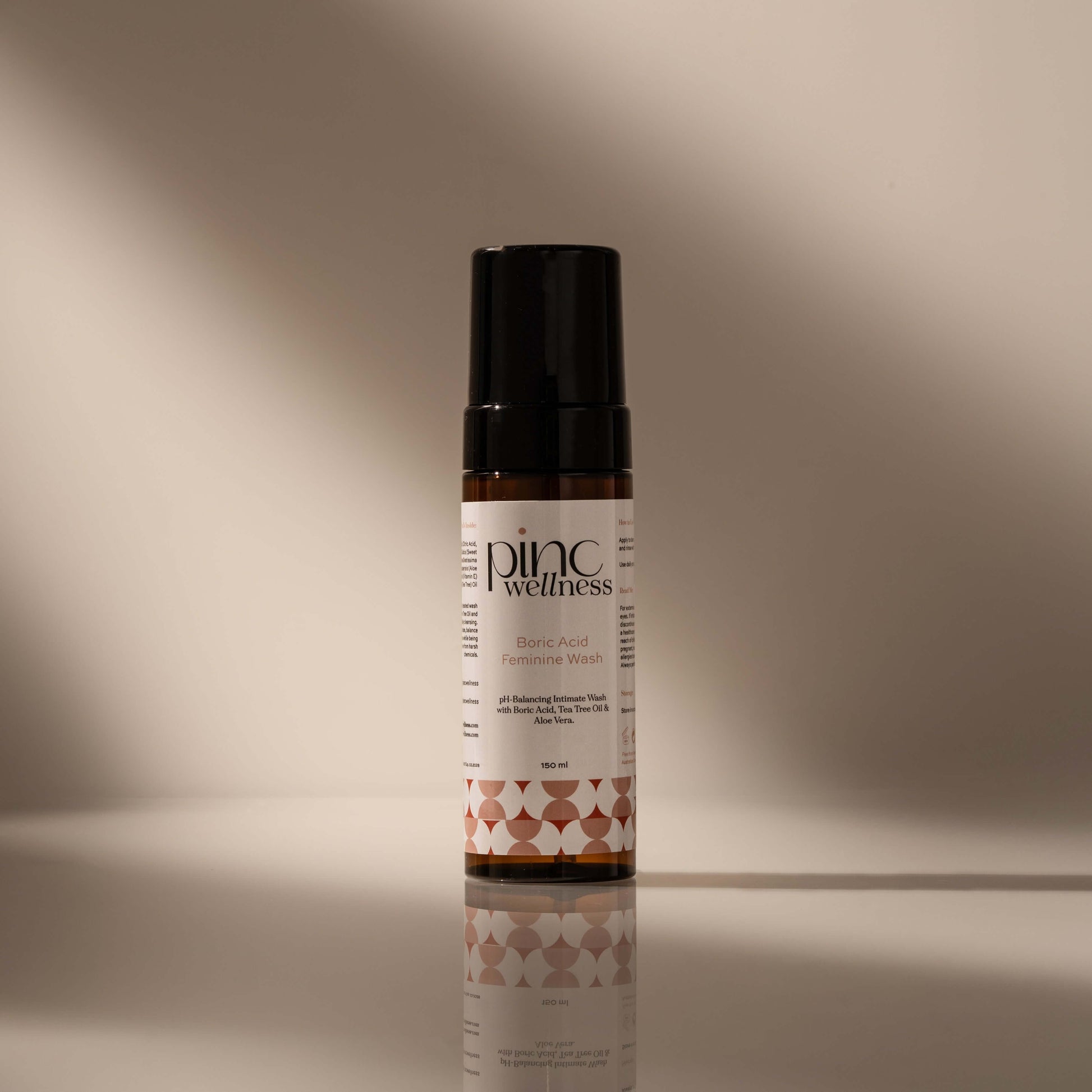 A bottle of tea tree wash by Pinc Wellness