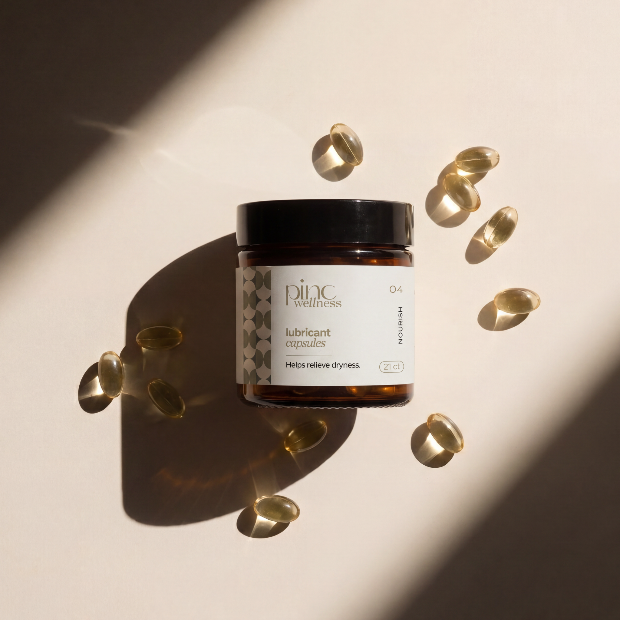 Jar of 'Pine Wellness' lubricant capsules with scattered capsules on a light background