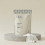 Package of 'pinc wellness' intimate wipes on a beige background