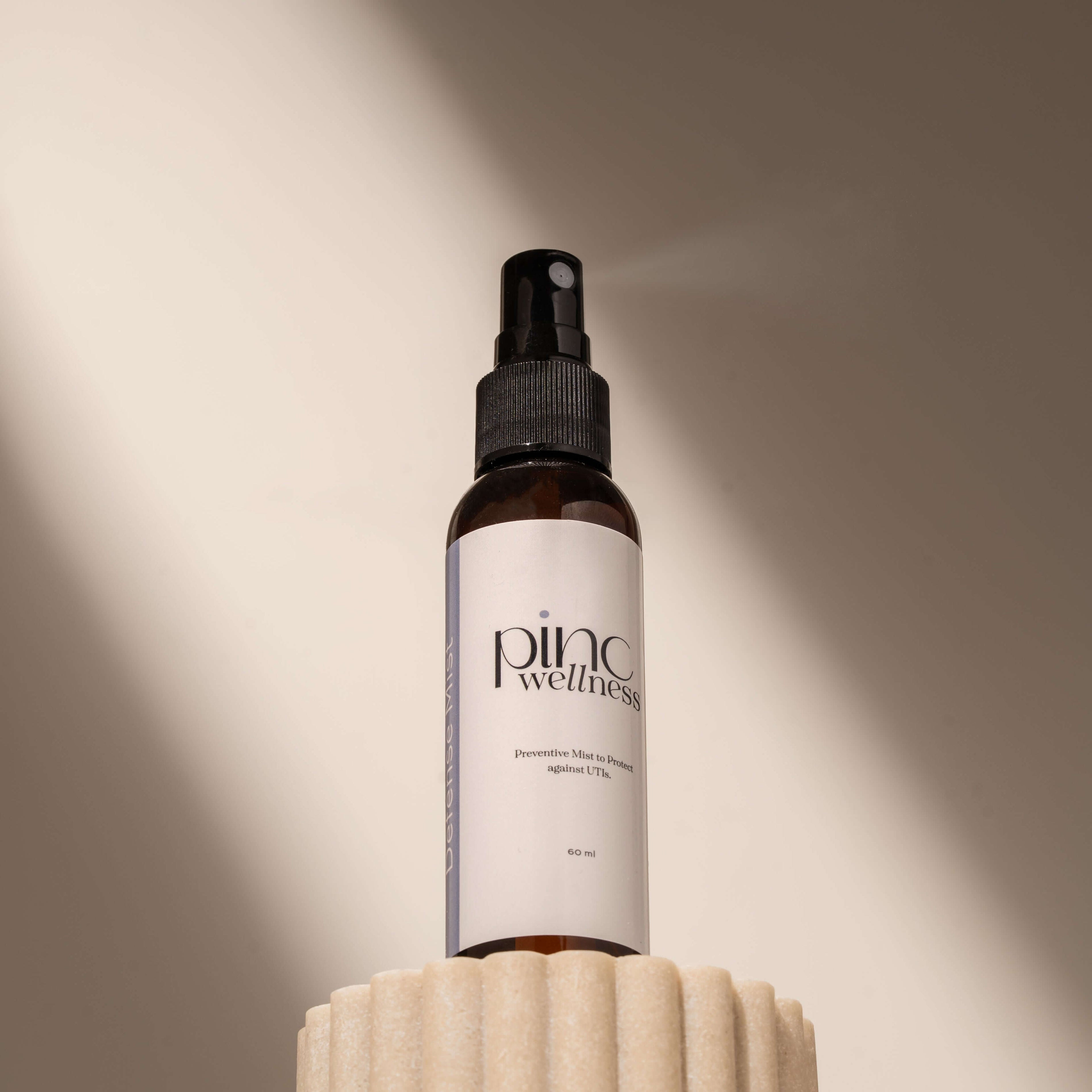 A bottle of UTI Prevent Mist by Pinc Wellness