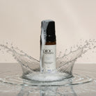 a bottle wash with dark cap by Pinc Wellness